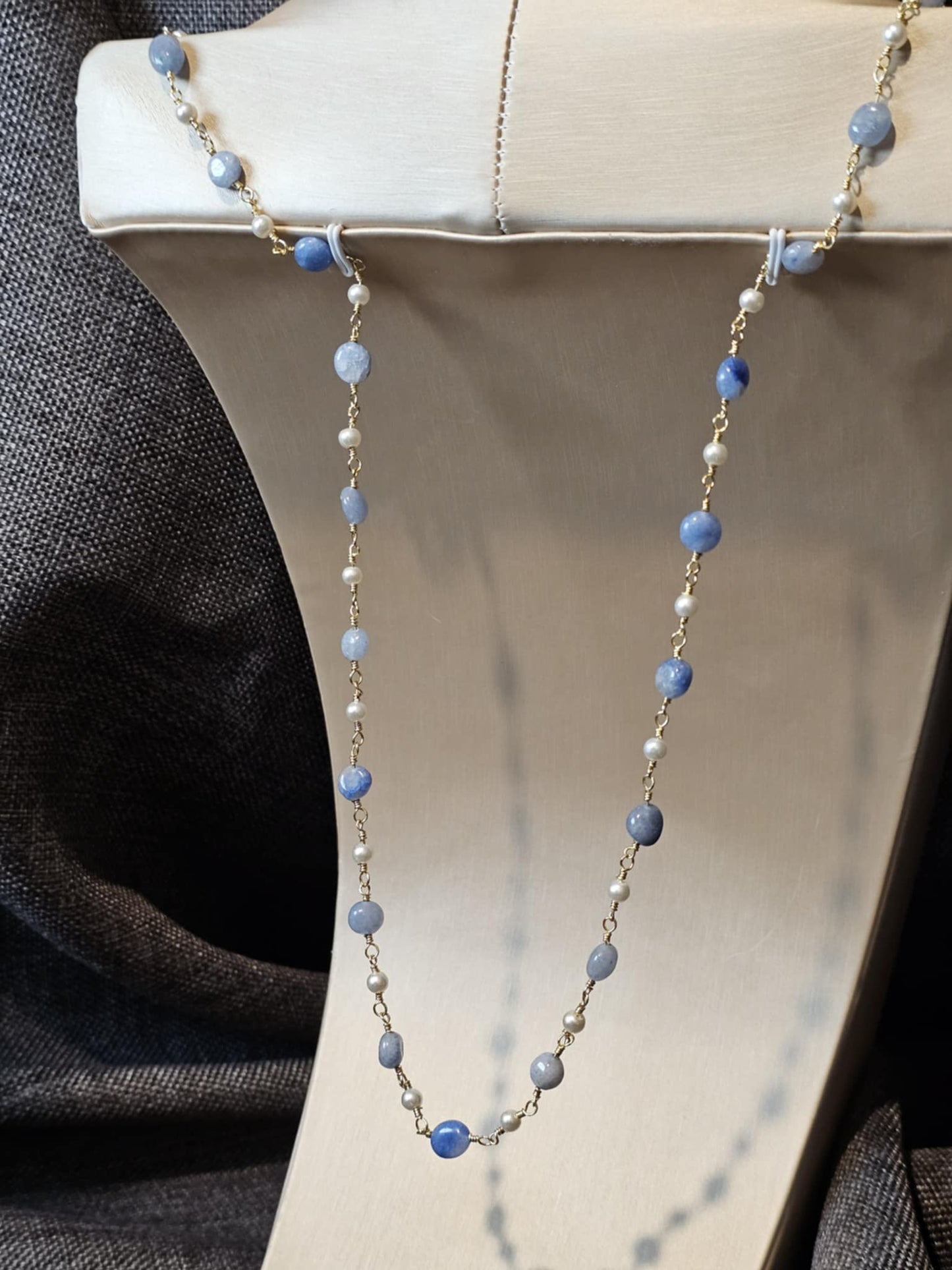 COD:TGP0002 – Collana lunga porta-essenze in legno di ulivo, agate e acciaio/ottone